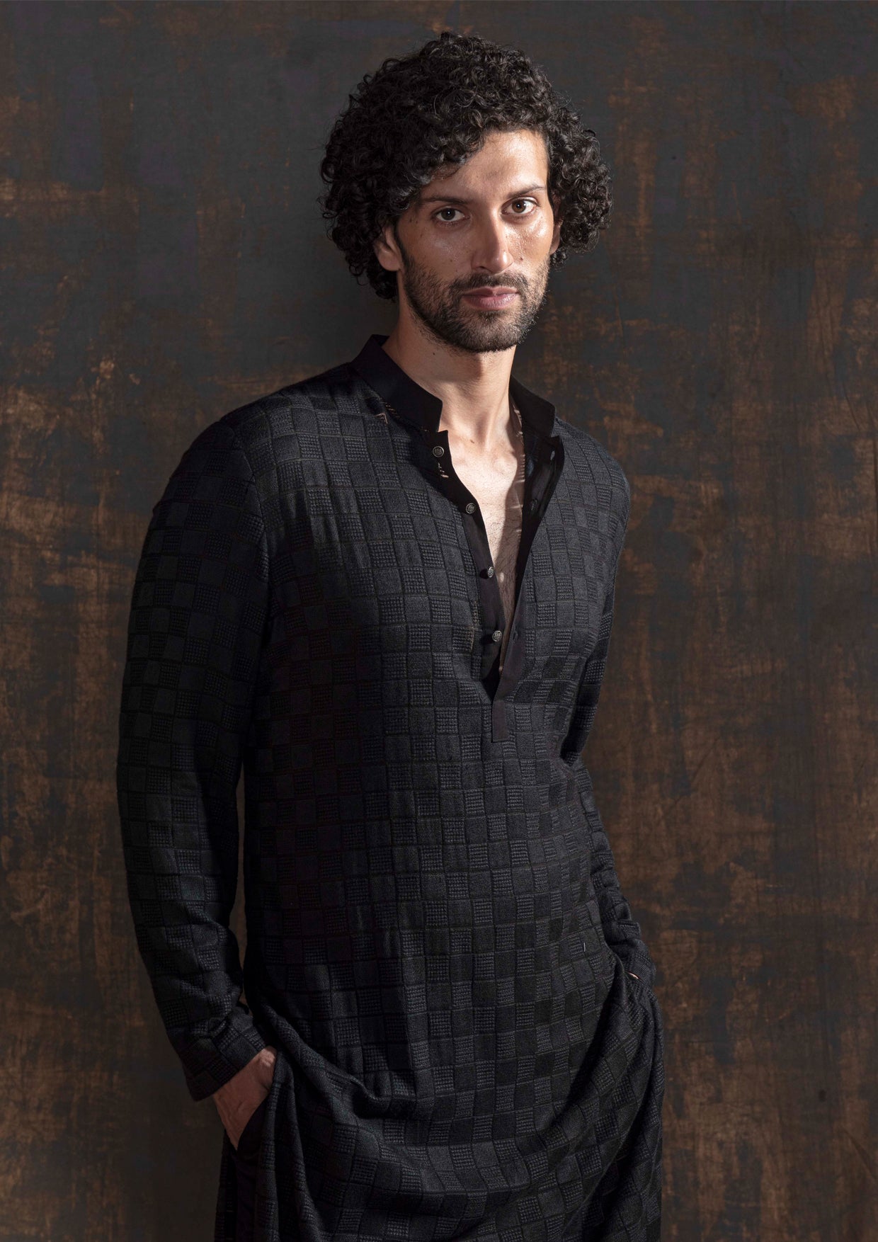 Black embroidered kurta with black pant cut pajama.