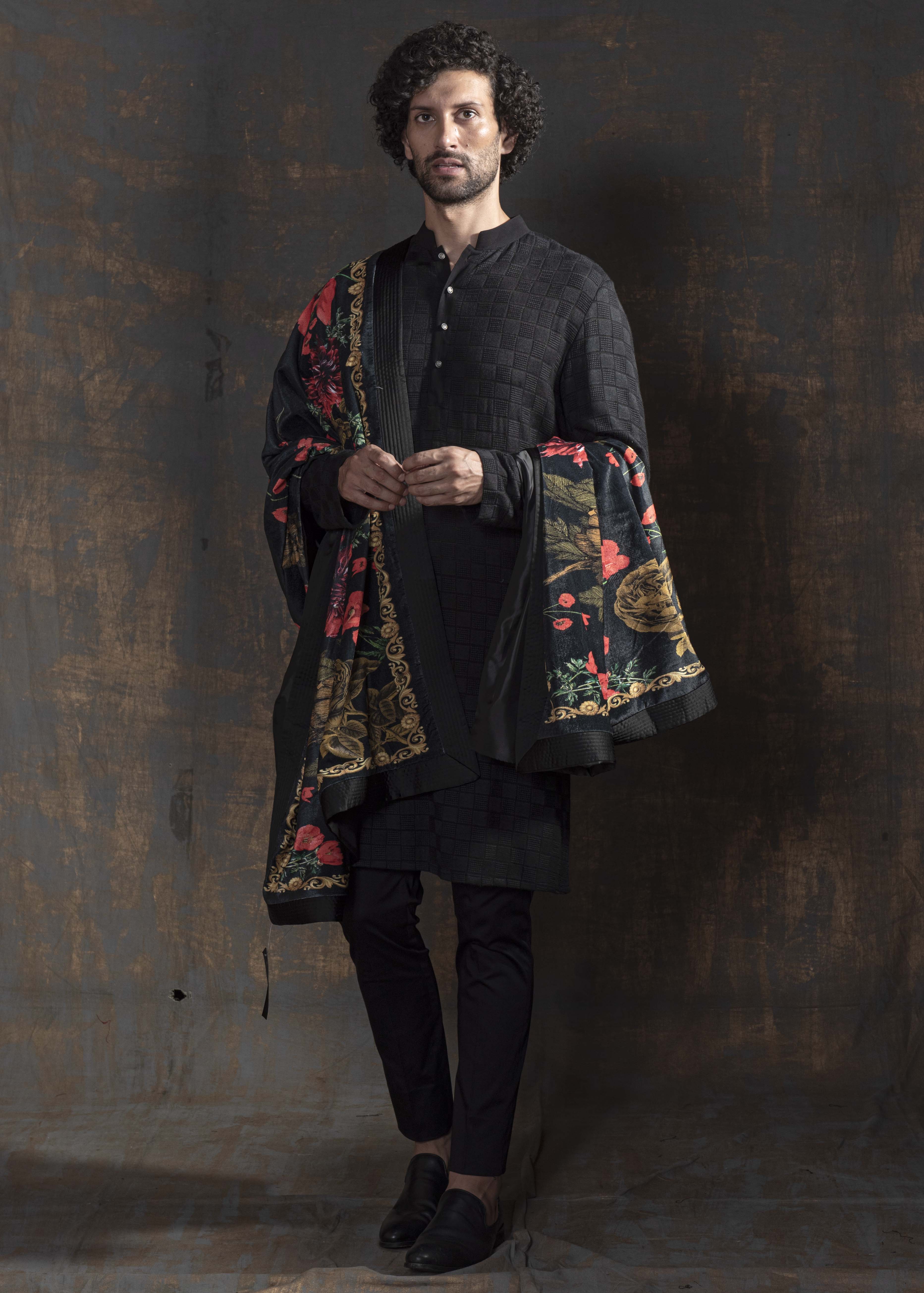 Black embroidered kurta with black pant cut pajama.