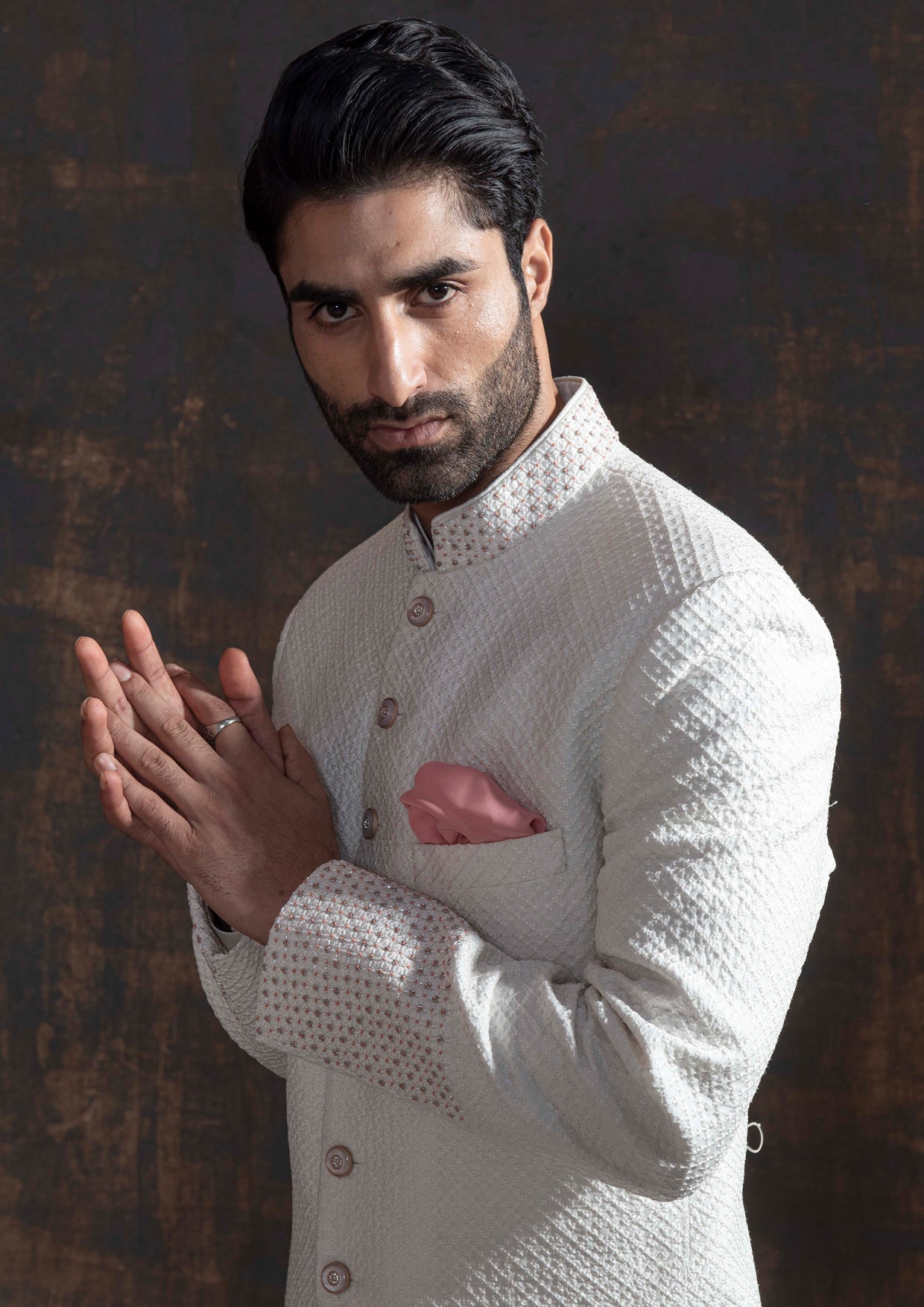 White self embroidered sherwani with off white kurta pajama.