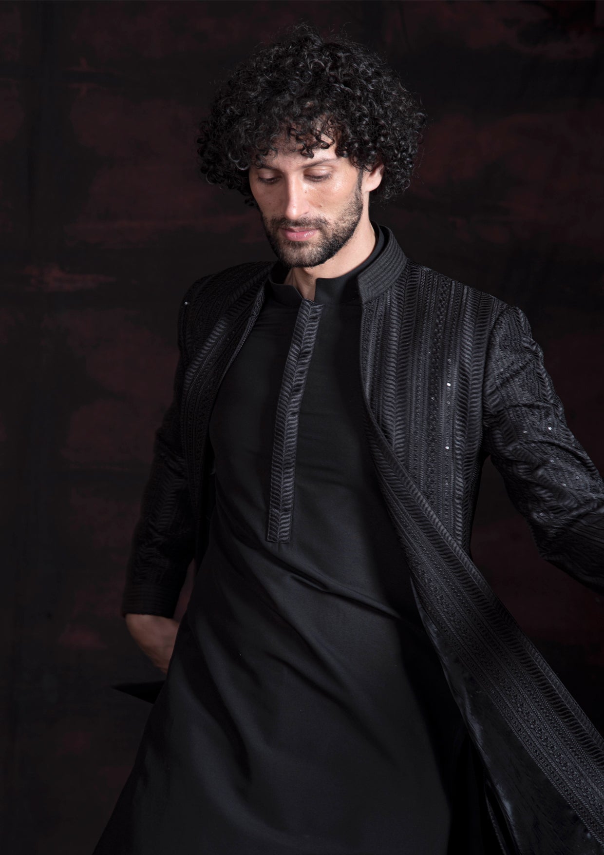 Black open indo western with black kurta pajama.