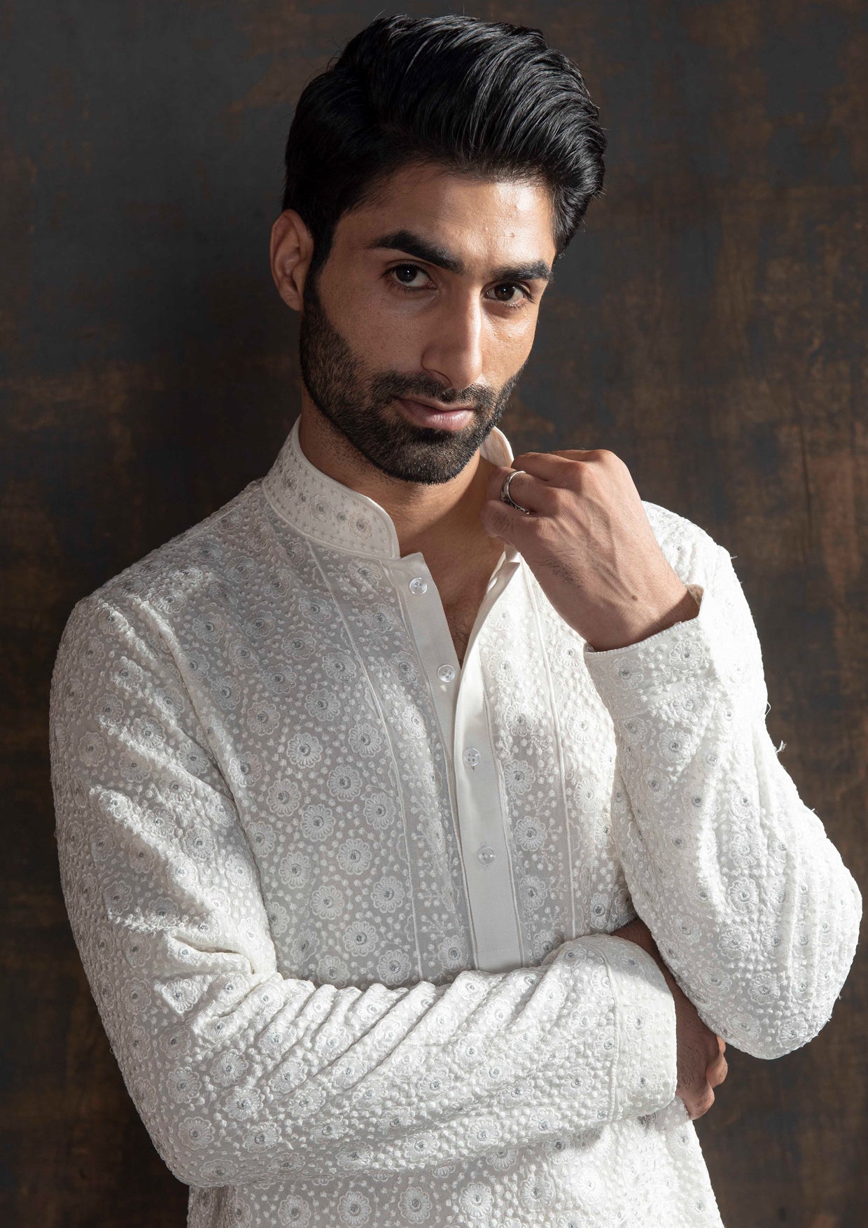 Ivory embroidered kurta paired up with ivory pant pajama.