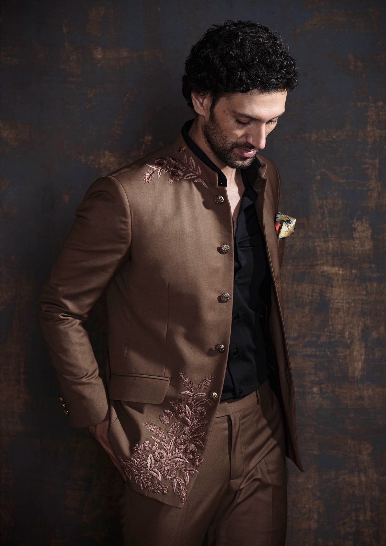 Brown bandgala suit with self on self floral embroidery.