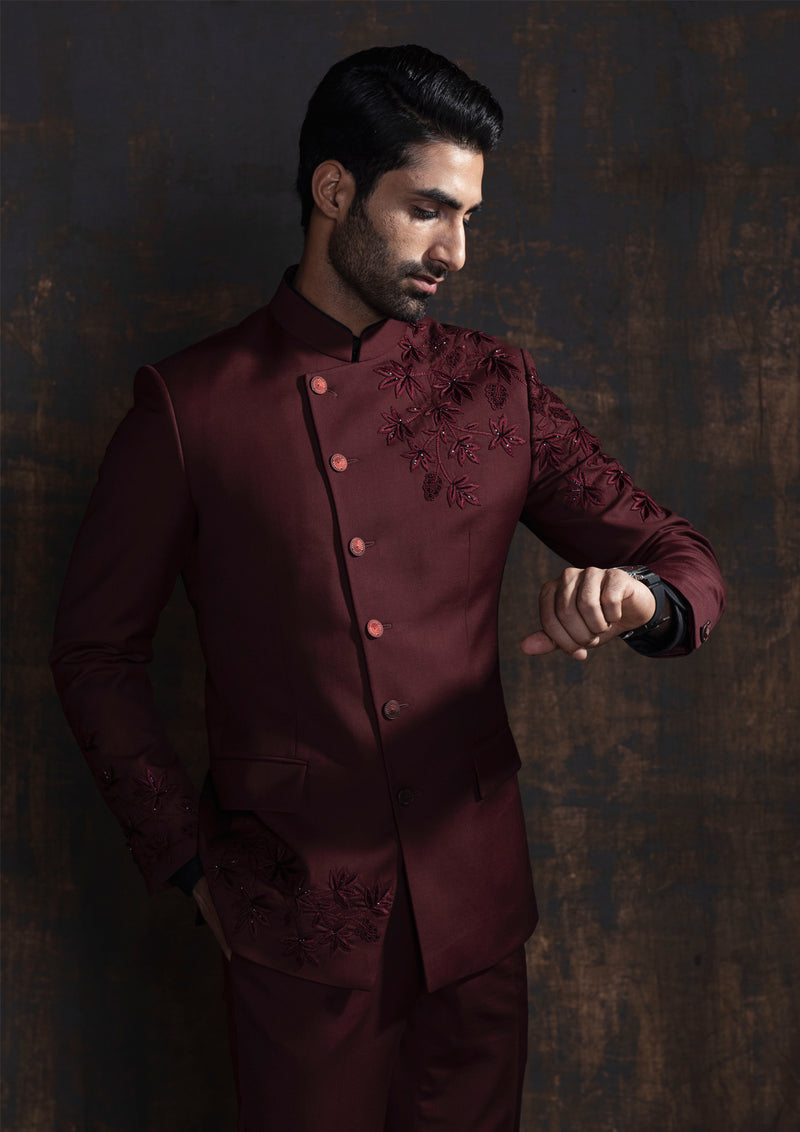 Red designer bandgala suit with thread embroidery which is further enhanced with carefully crafted hand embroidery.