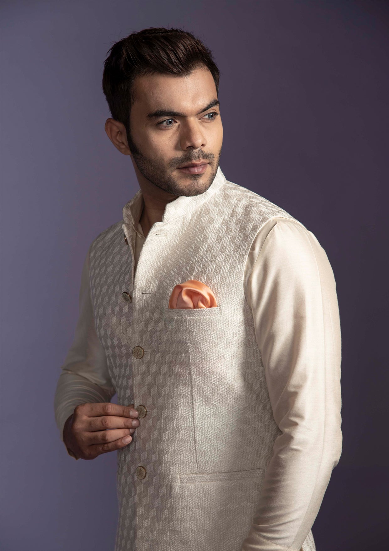 Champagne gold nehru jacket with champagne coloured kurta and chooridar.