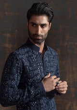 Blue embroidered kurta paired up with ivory pant pajama.