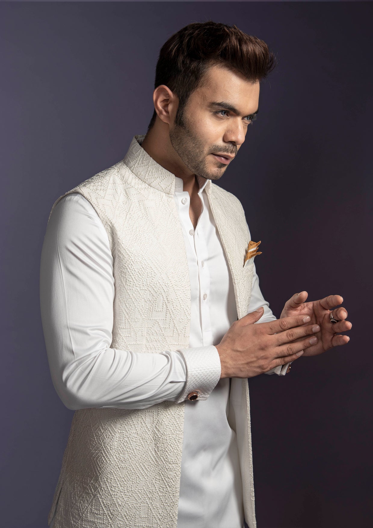 Off white embroidered nehru jacket with white kurta pajama.