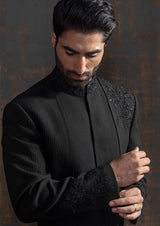 Black embroidered indo western with black kurta pajama.