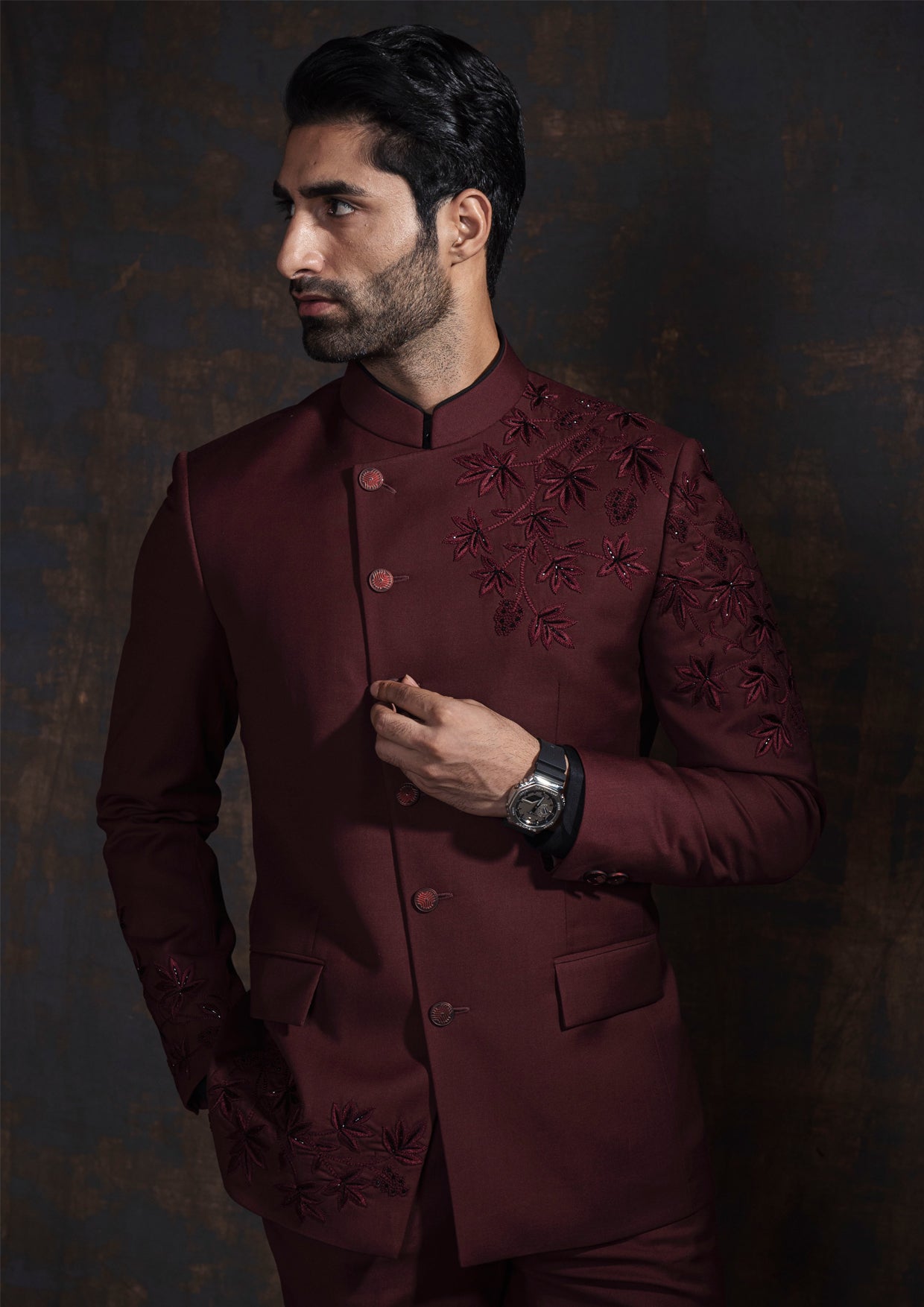 Red designer bandgala suit with thread embroidery which is further enhanced with carefully crafted hand embroidery.