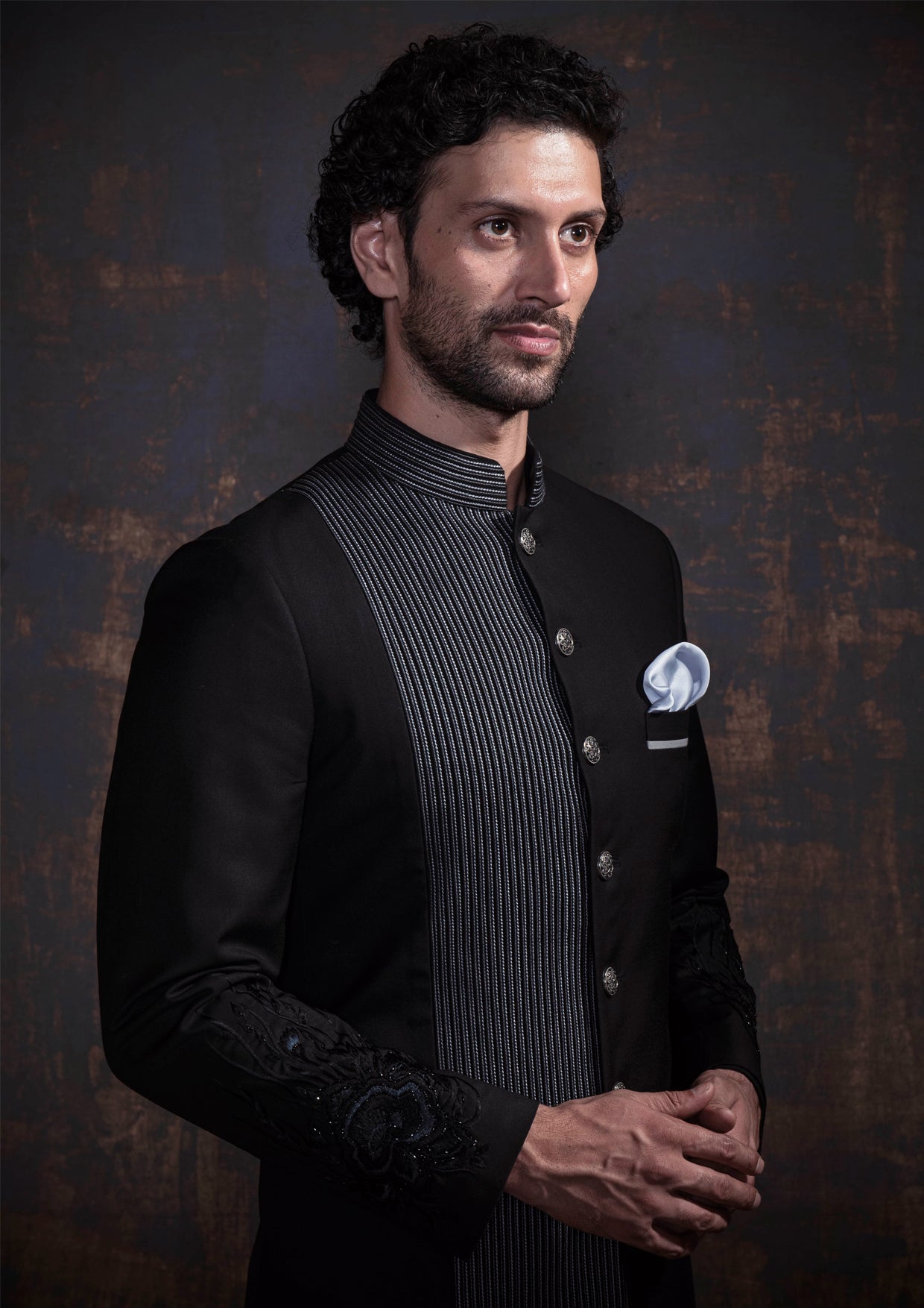 Black embroidered indo western with black kurta pajama.