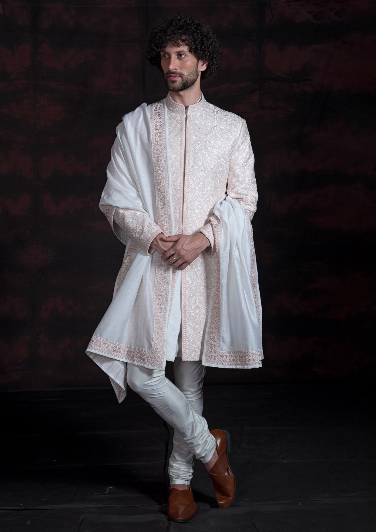 Classic ivory and pink sherwani.