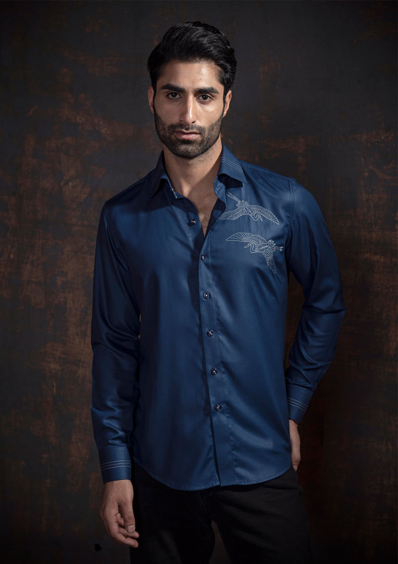 Blue embroidered shirt.