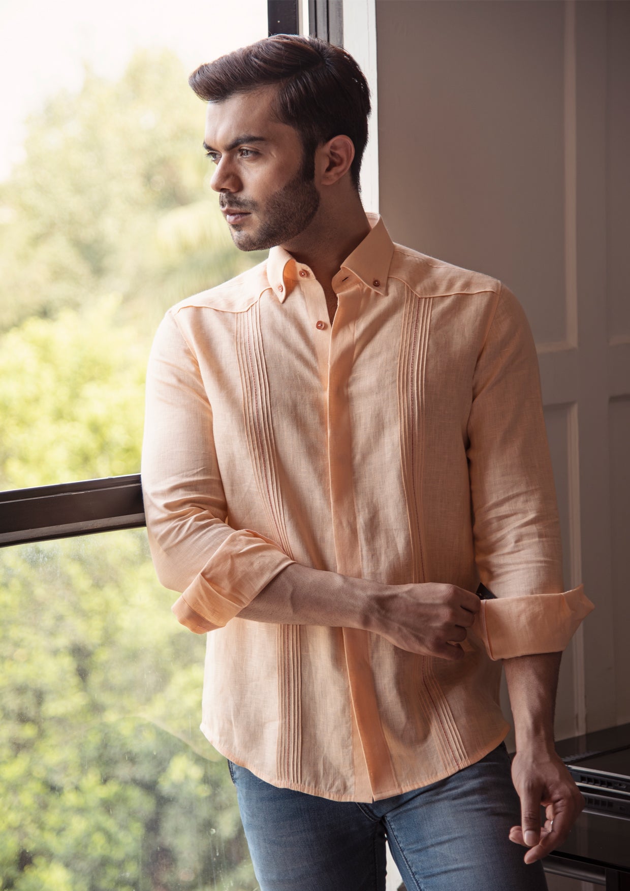 Peach linen shirt.