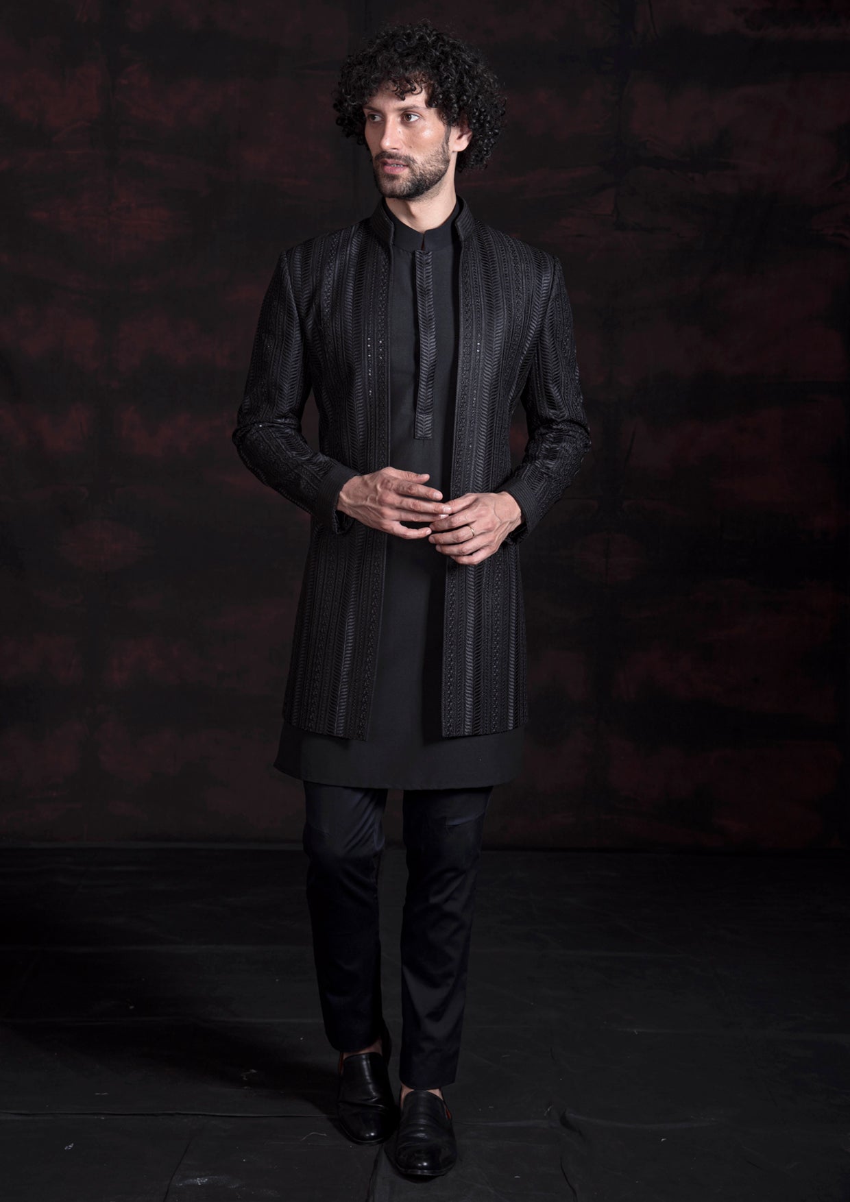 Black open indo western with black kurta pajama.