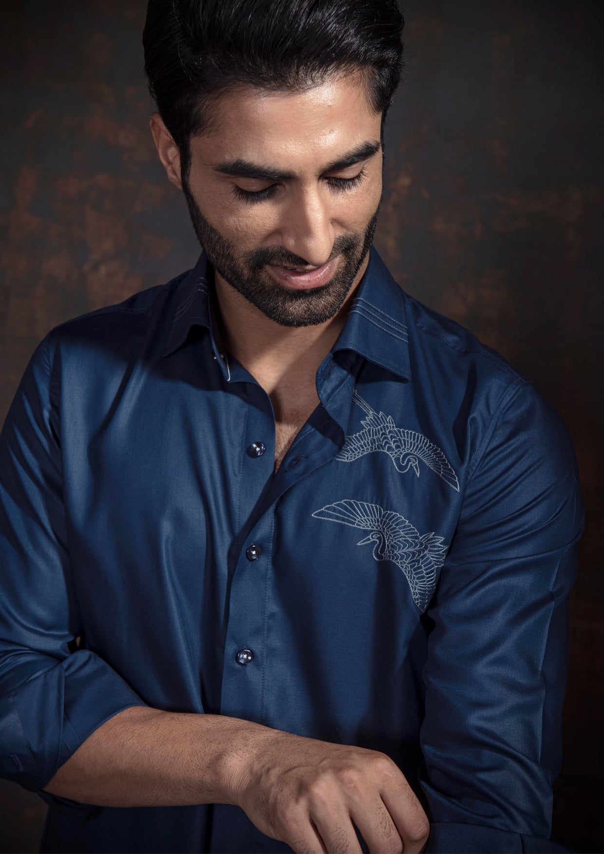 Blue embroidered shirt.