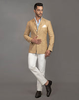 Beigish brown shacket with safari collar and white buttons.  Paired up with ivory pants.