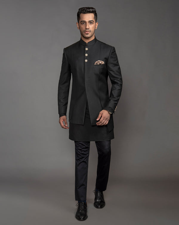 Black Asymmetrical Bandgala Jacket with textured buttons and drain work running alongside.  Paired up with black kurta pajama.
