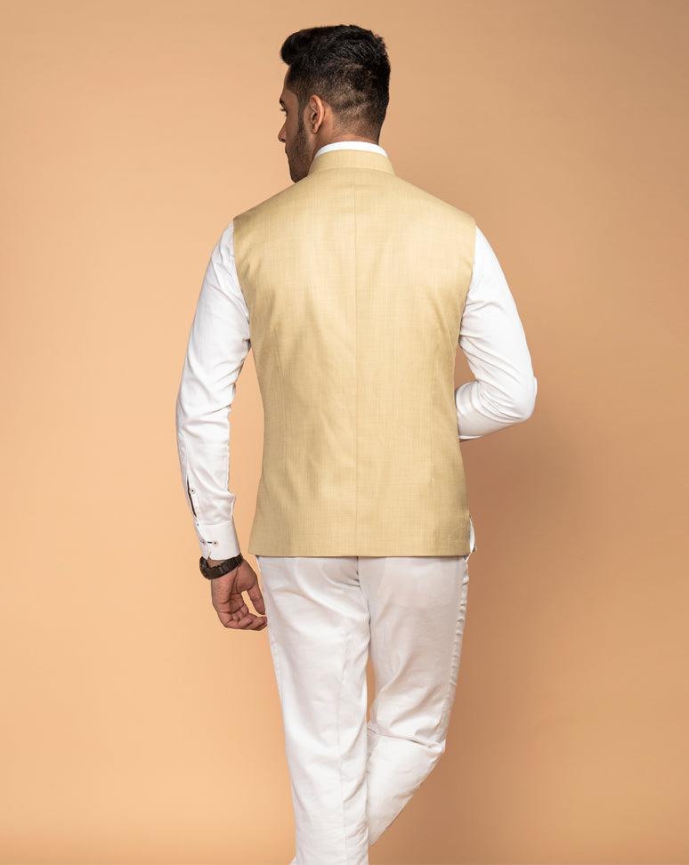 Beige Nehru Jacket with shirt and pants.