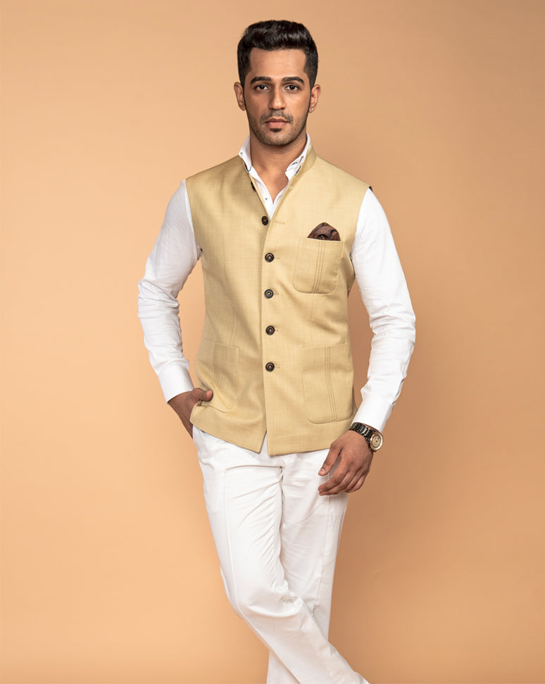 Beige Nehru Jacket with shirt and pants.