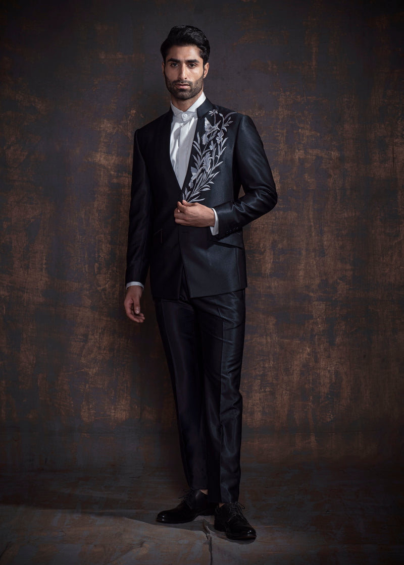 Charcoal grey designer suit with light grey embroidery.