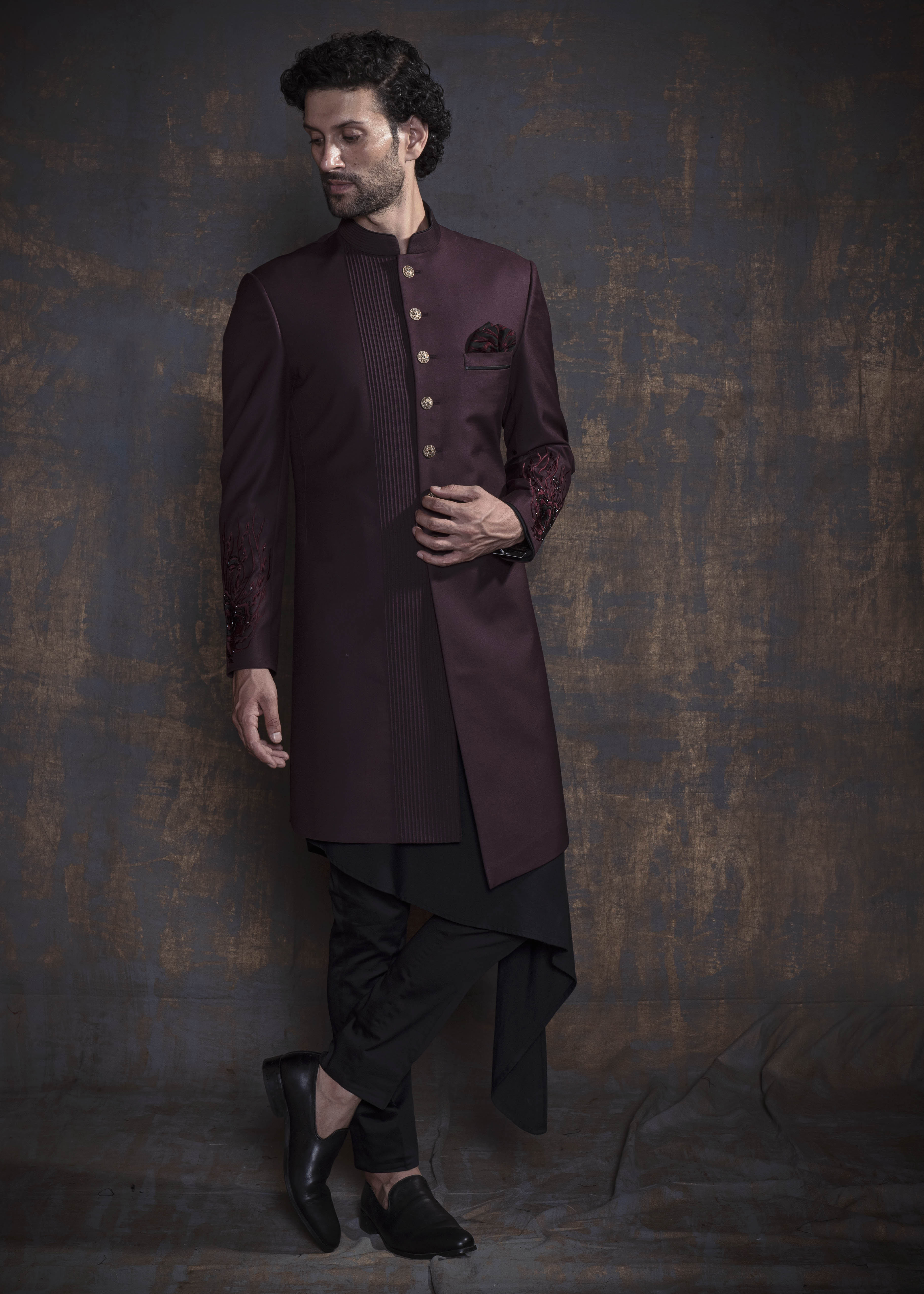 Wine embroidered indo western.  Paired up with black kurta and pajama.