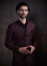 Wine embroidered indo western.  Paired up with black kurta and pajama.