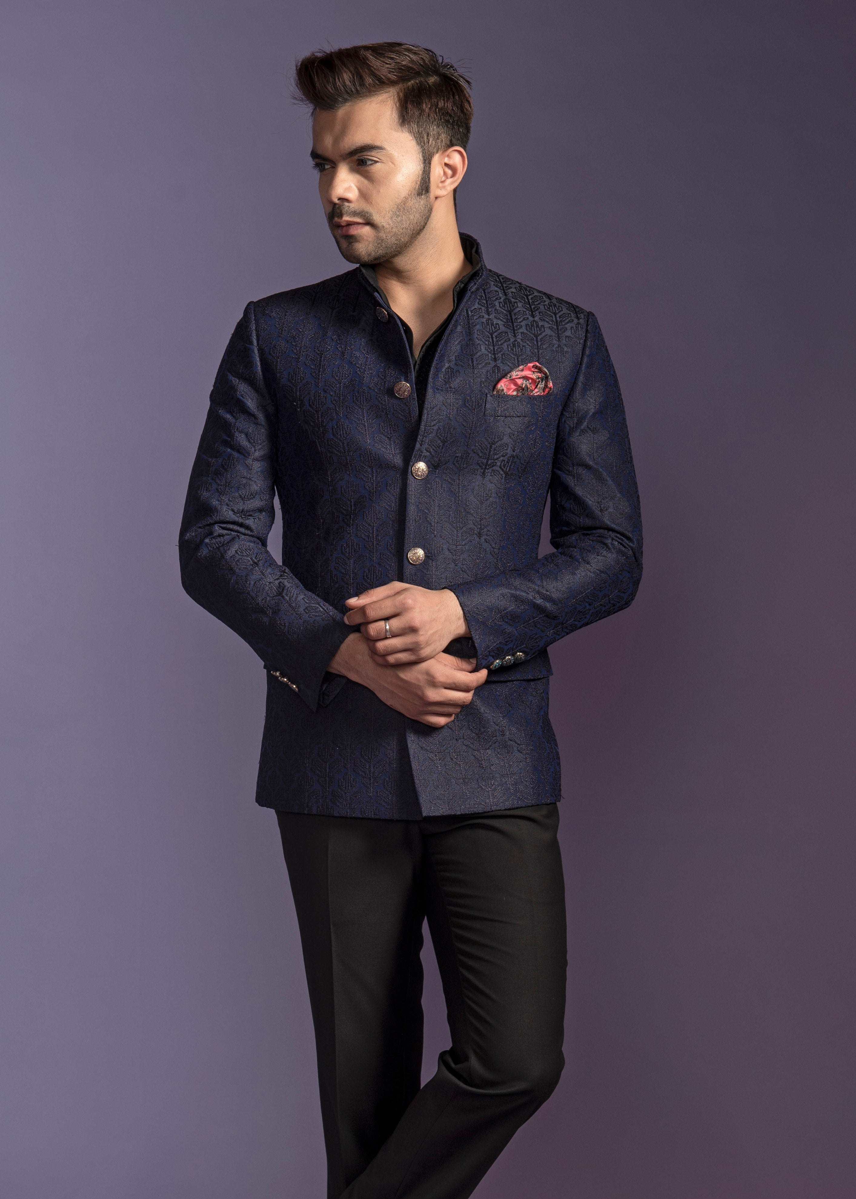 Blue silk based bandgala jacket with all over embroidery. Paired up with jet black pants.