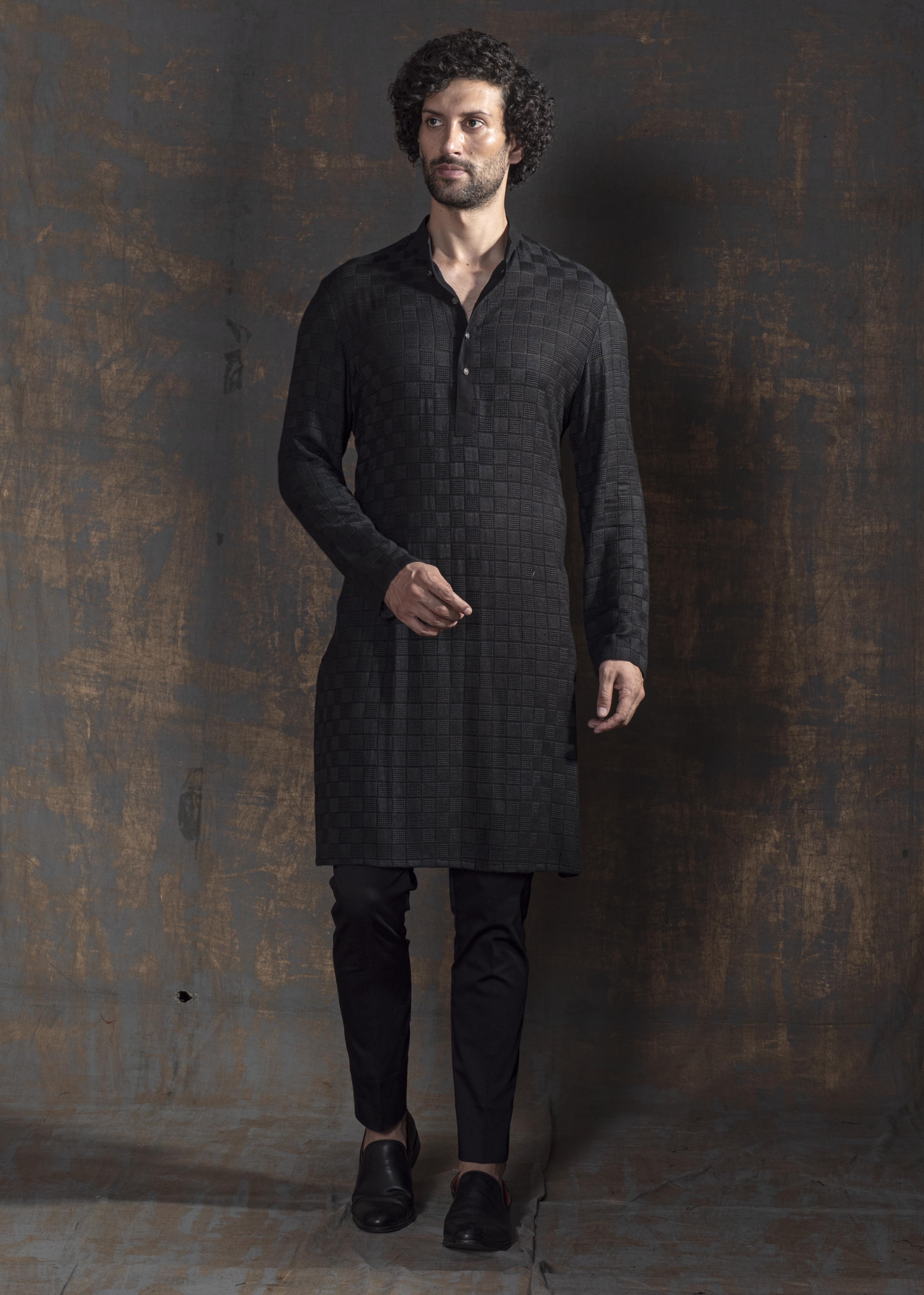 Black embroidered kurta with black pant cut pajama.