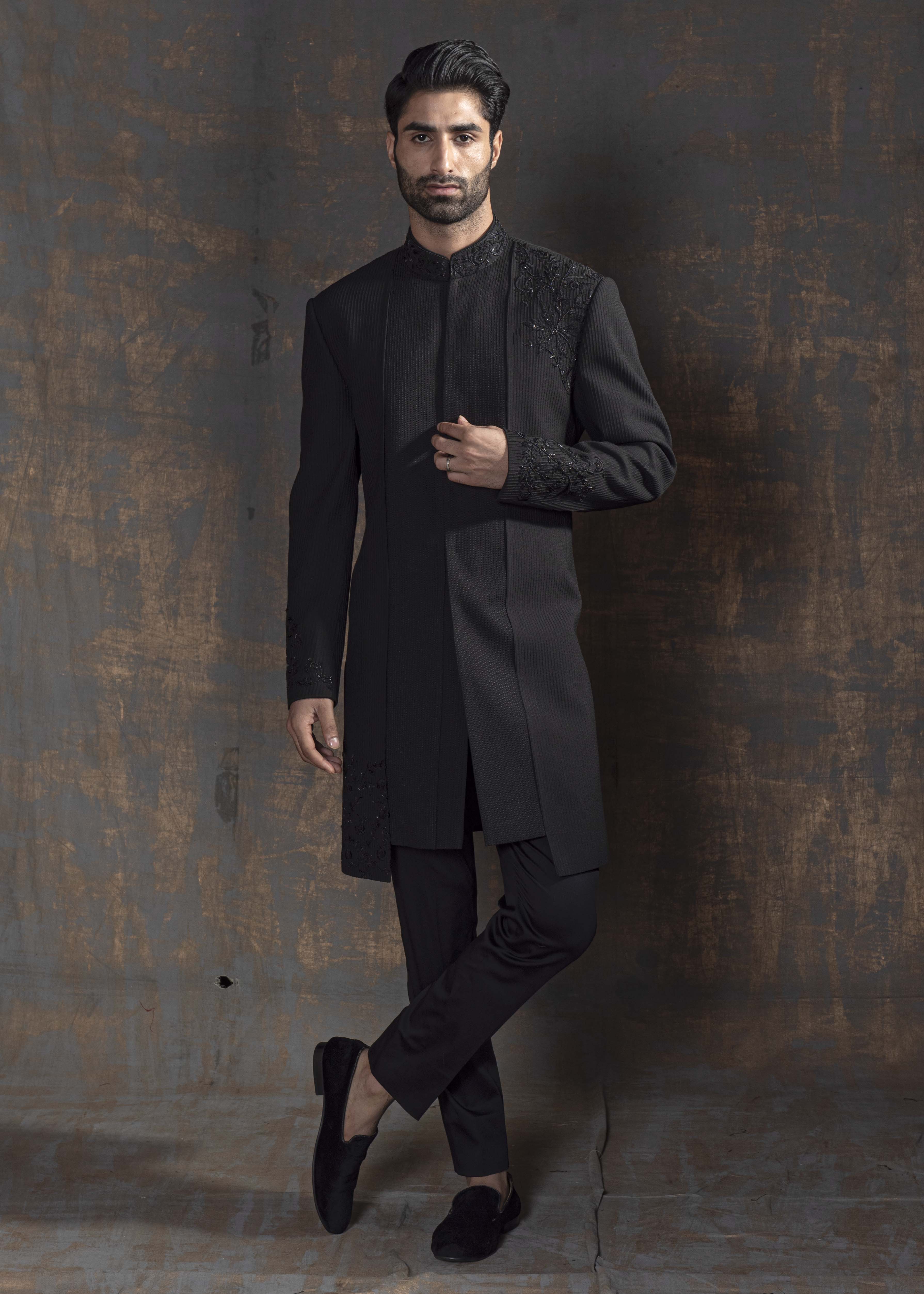 Black embroidered indo western with black kurta pajama.