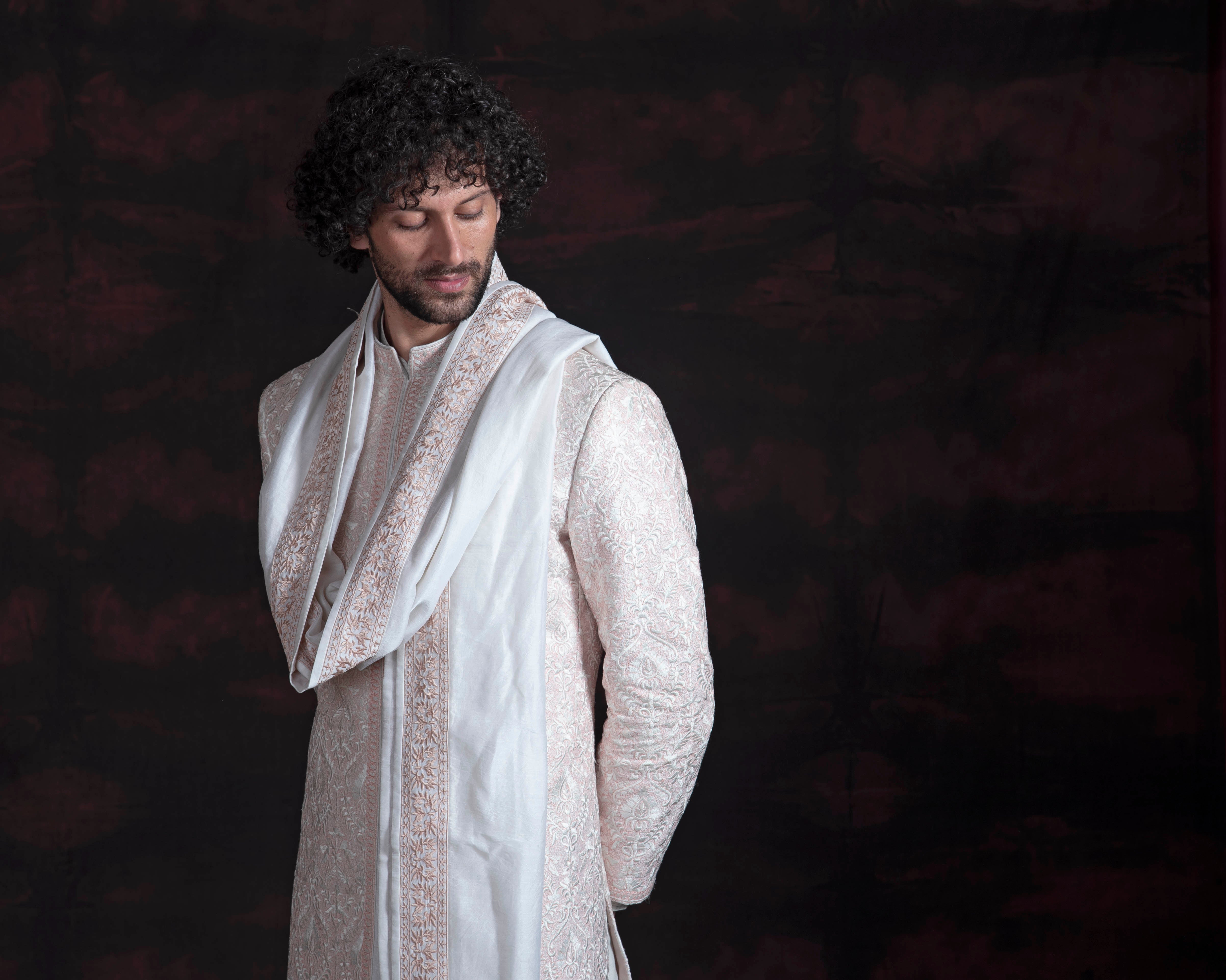 Classic ivory and pink sherwani.