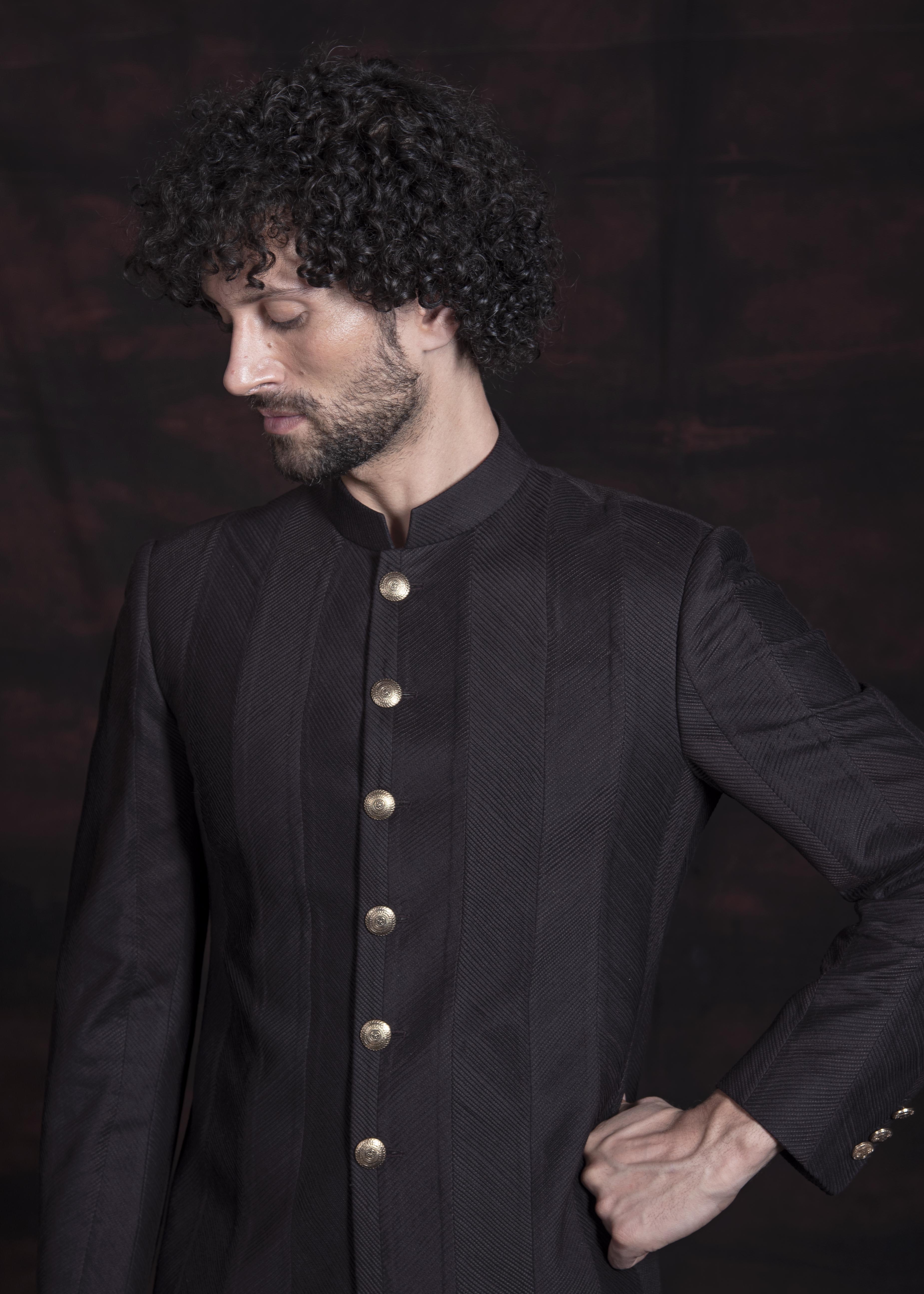 Wine embroidered indo western with black kurta and pajama.