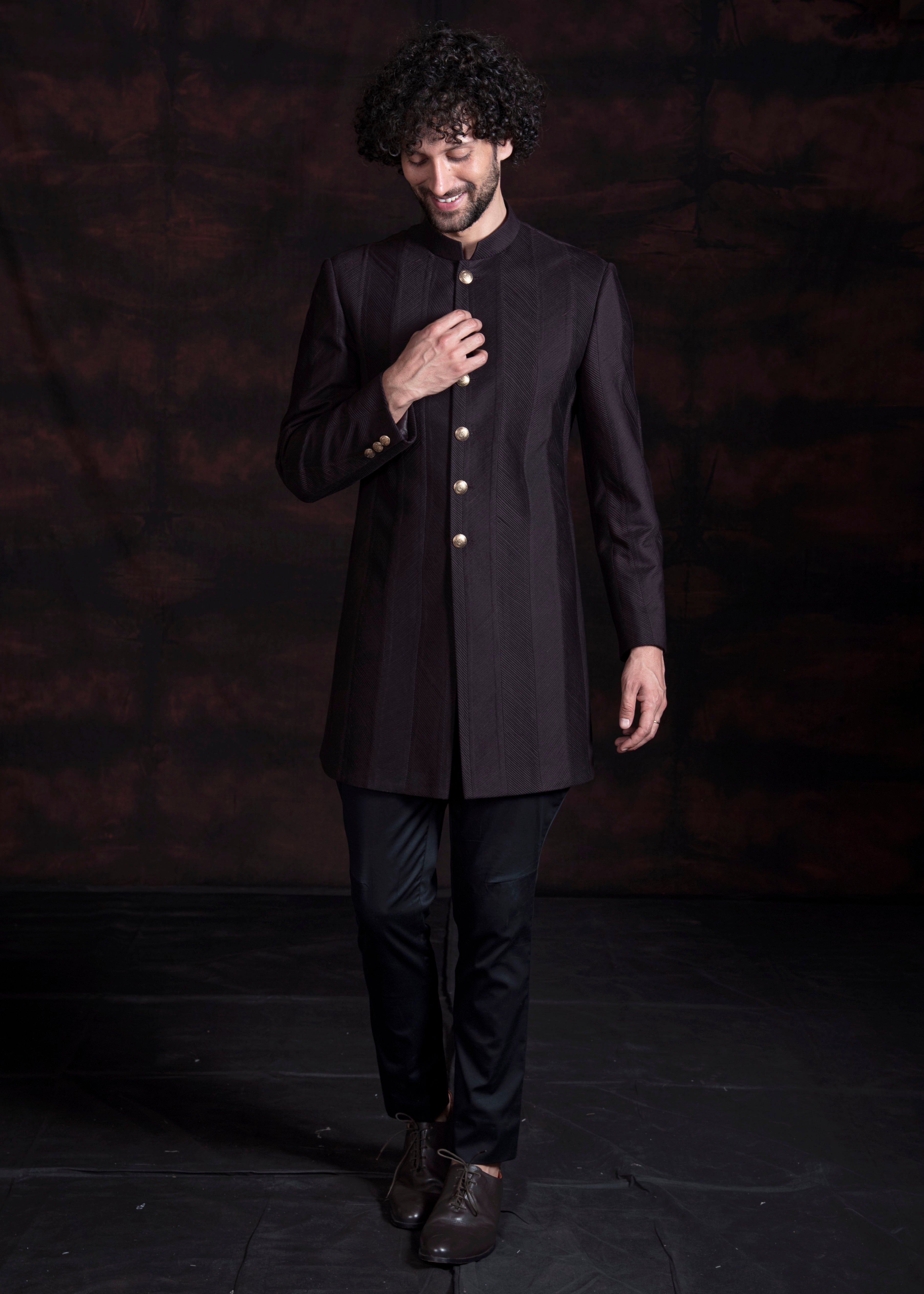 Wine embroidered indo western with black kurta and pajama.