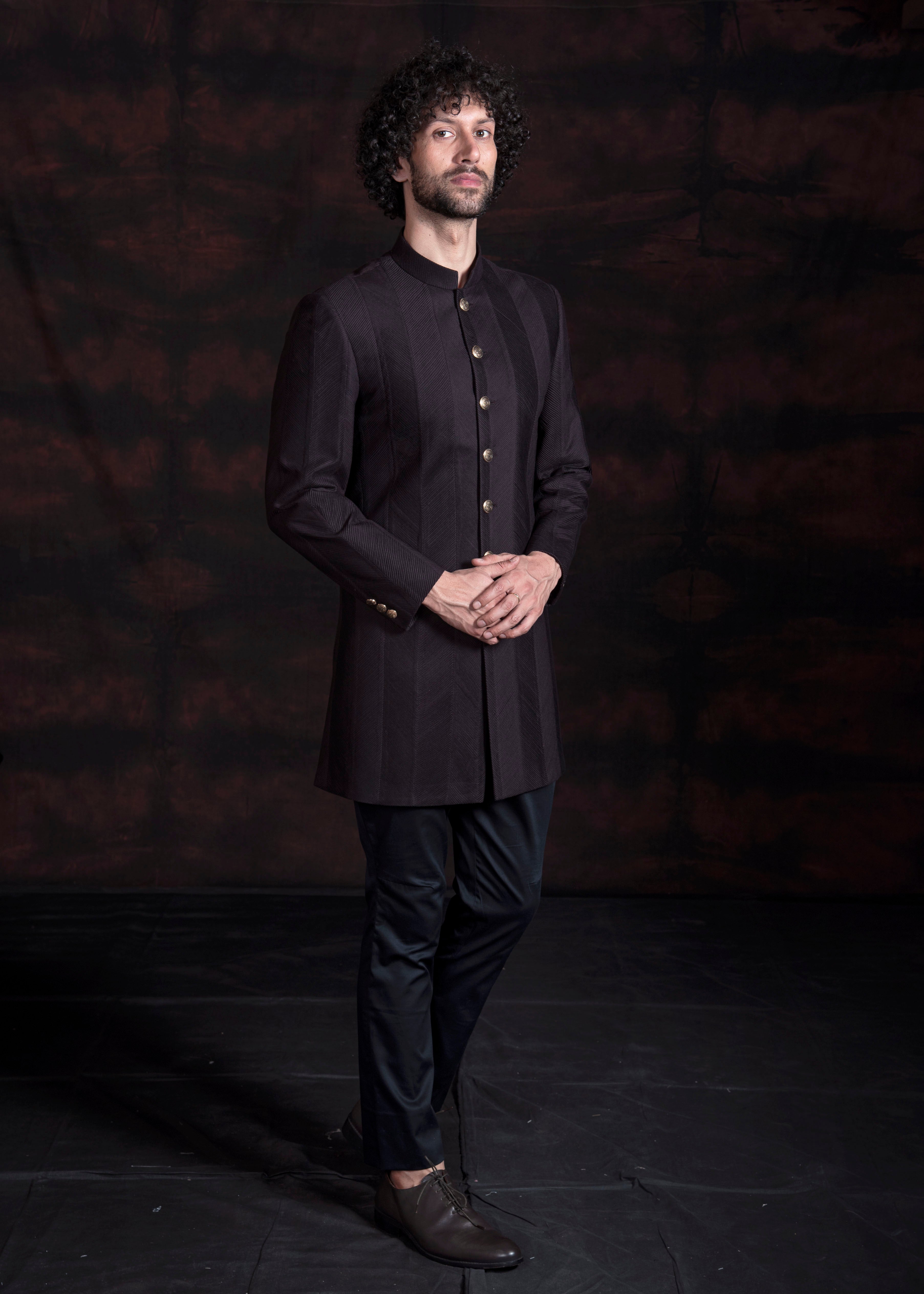 Wine embroidered indo western with black kurta and pajama.