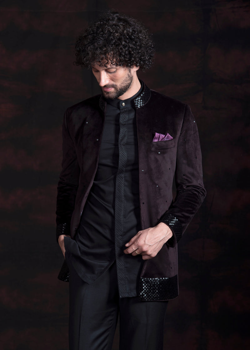 Wine coloured open bandgala jacket in velvet fabric with black hand embroidery on collar and cuffs.  Paired up with black embroidered shirt and pants. 