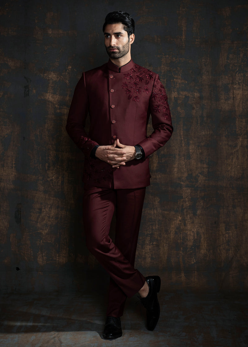 Red designer bandgala suit with thread embroidery which is further enhanced with carefully crafted hand embroidery.