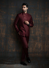 Red designer bandgala suit with thread embroidery which is further enhanced with carefully crafted hand embroidery.