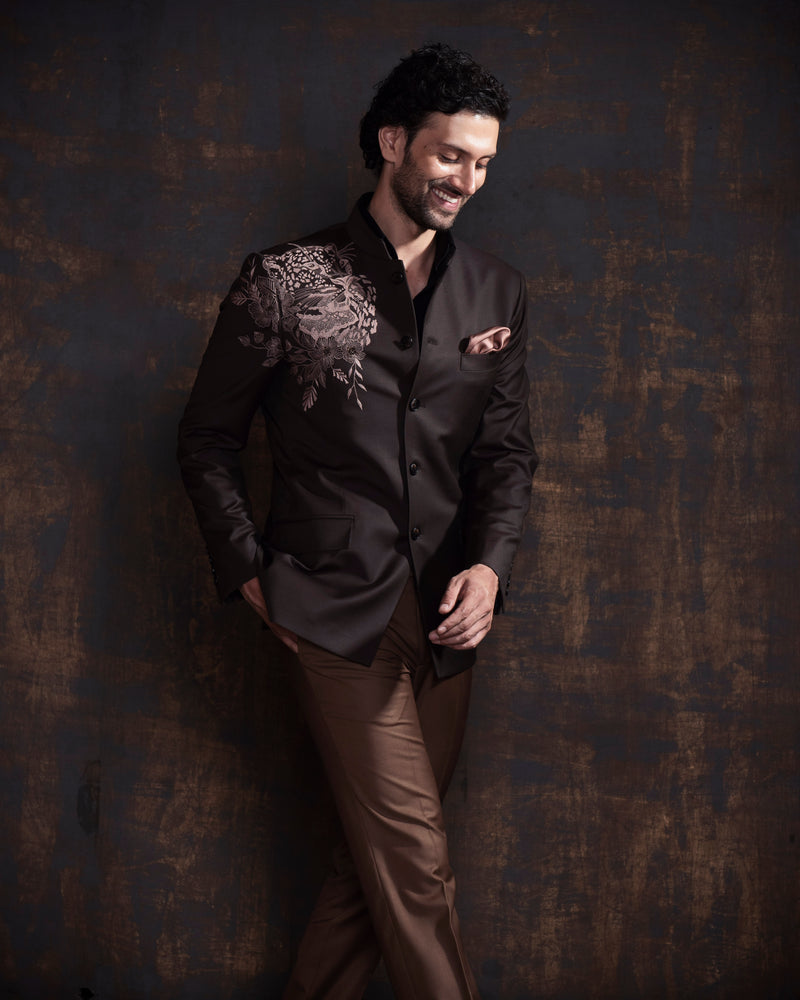 Deep brown bandgala jacket with light brown embroidery. Paired up with caramel coloured pants.