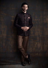 Multicoloured embroidered bandgala jacket. Paired up with caramel coloured pants.