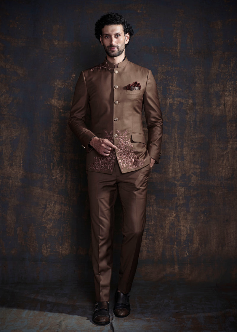 Brown bandgala suit with self on self floral embroidery.