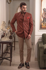 Rust coloured bandgala jacket with two pintucks running on both sides. Paired up with beige coloured pants.