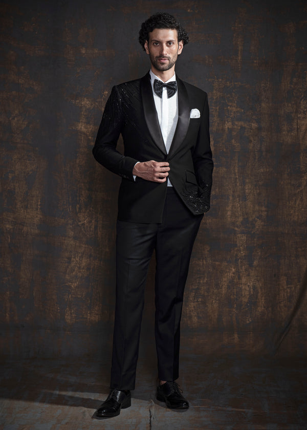 Black tuxedo with black hand embroidery.
