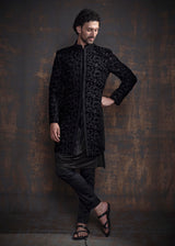Black self embroidered indo western with black kurta pajama.