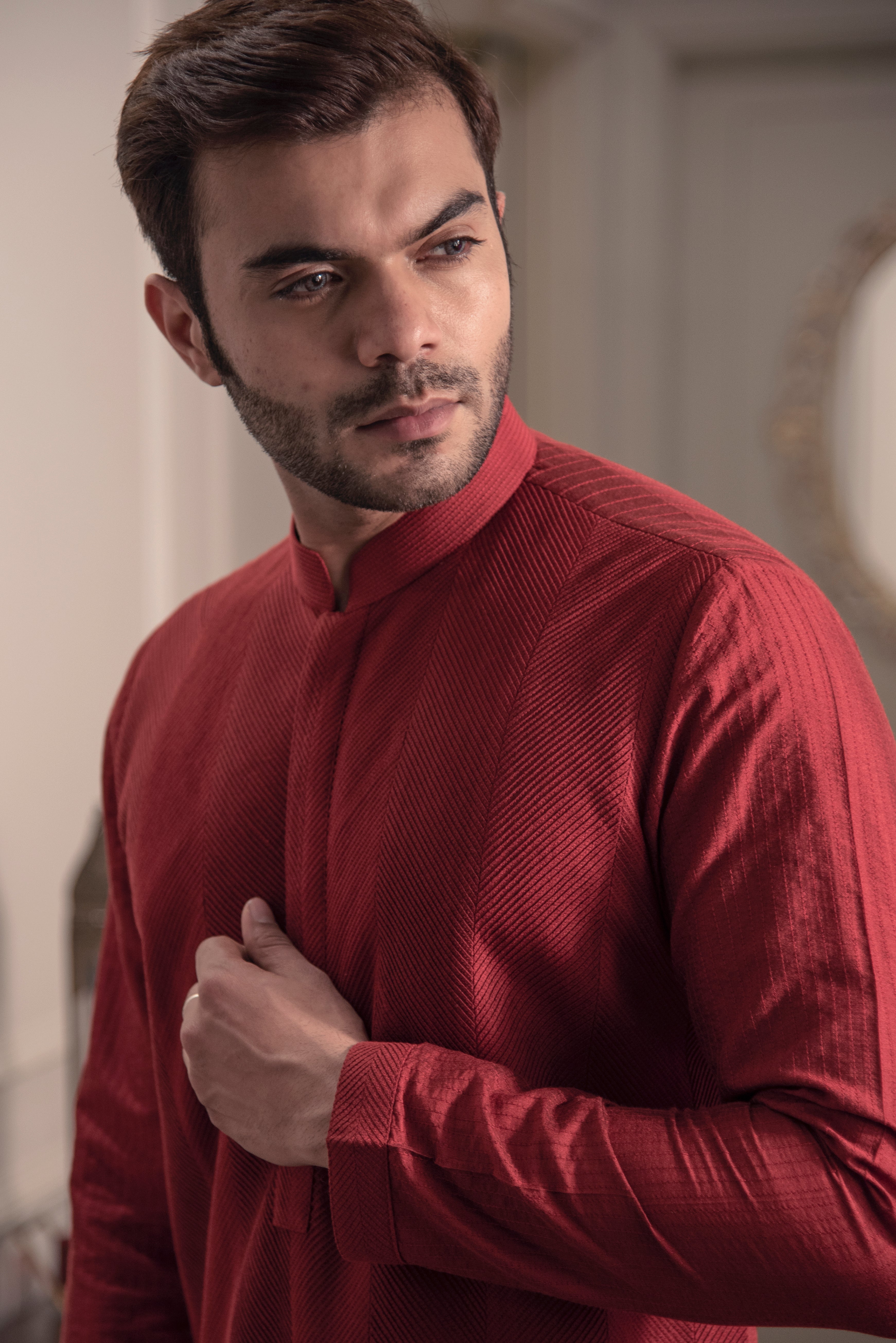 Red pin tuck kurta.