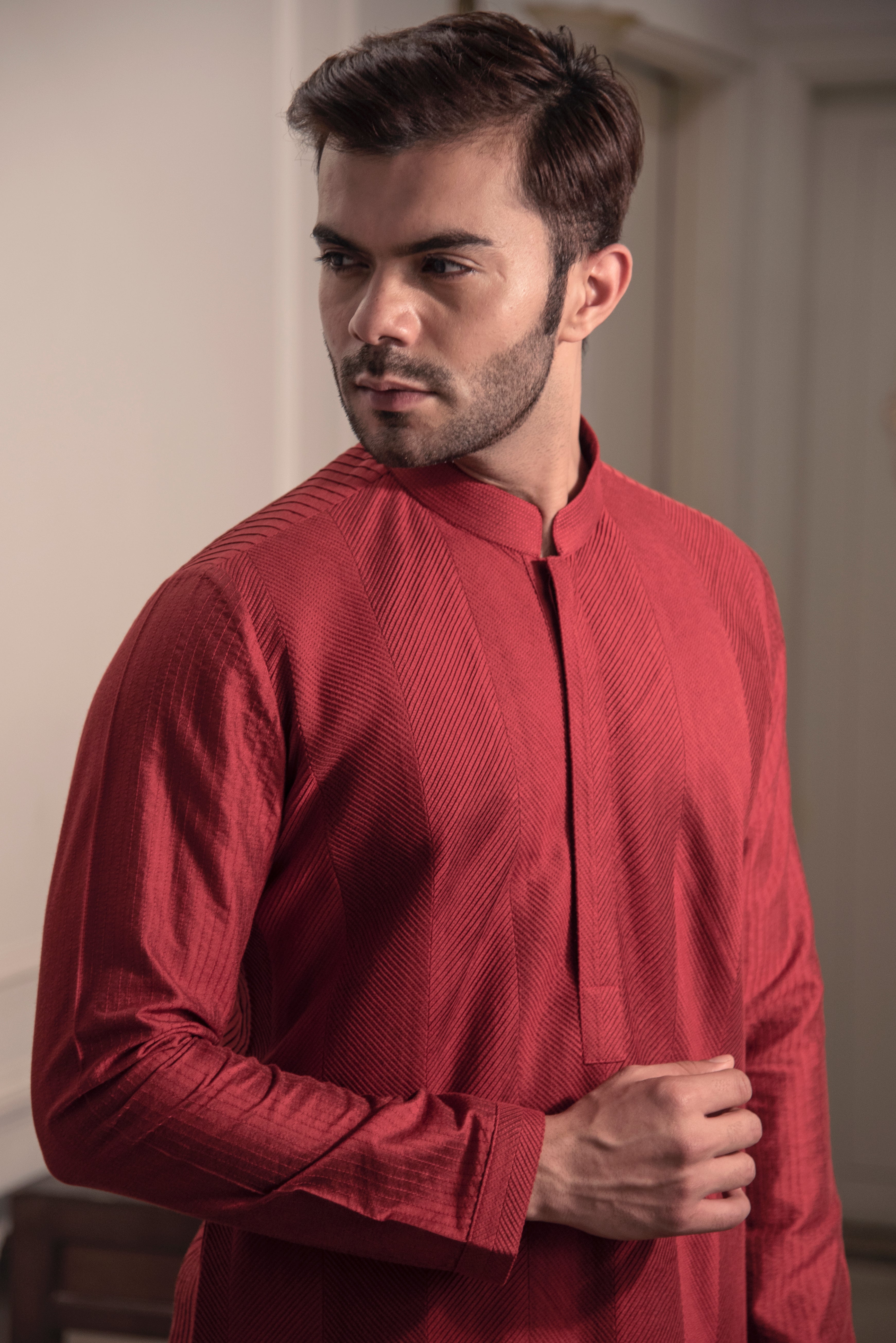 Red pin tuck kurta.