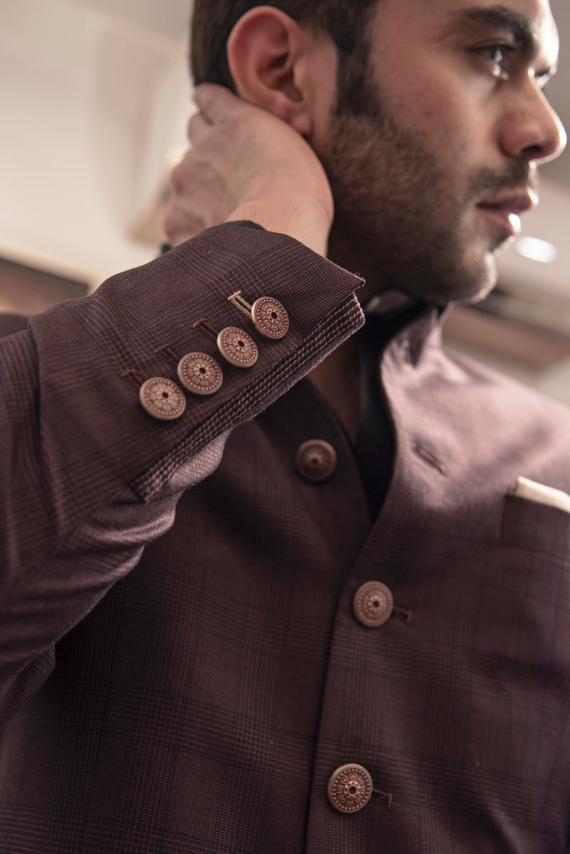 Brown self check bandgala jacket. Paired up with beige pants.
