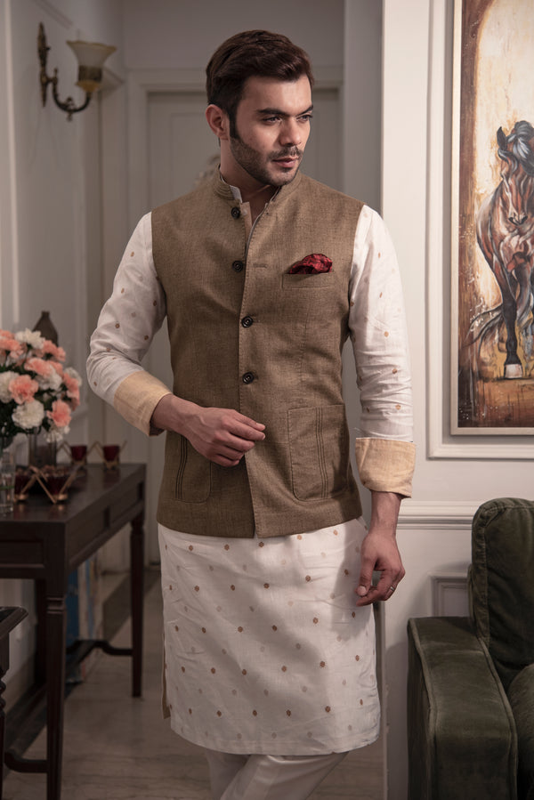 Earthy brown nehru jacket with off white printed kurta and off white pajama.