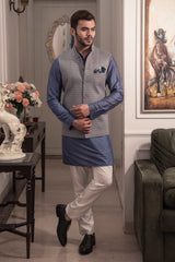 Grey embroidered nehru jacket paired up with blueish grey kurta and off white pajama.