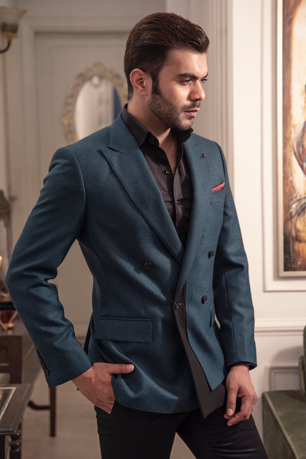 Sea green designer double breasted jacket. Paired up with jet black pants.