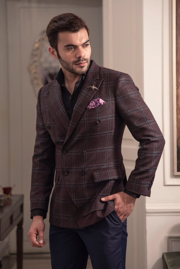 Wine coloured designer double breasted jacket. Paired up with navy blue pants.